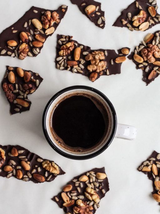 Chocolate pieces on a white surface